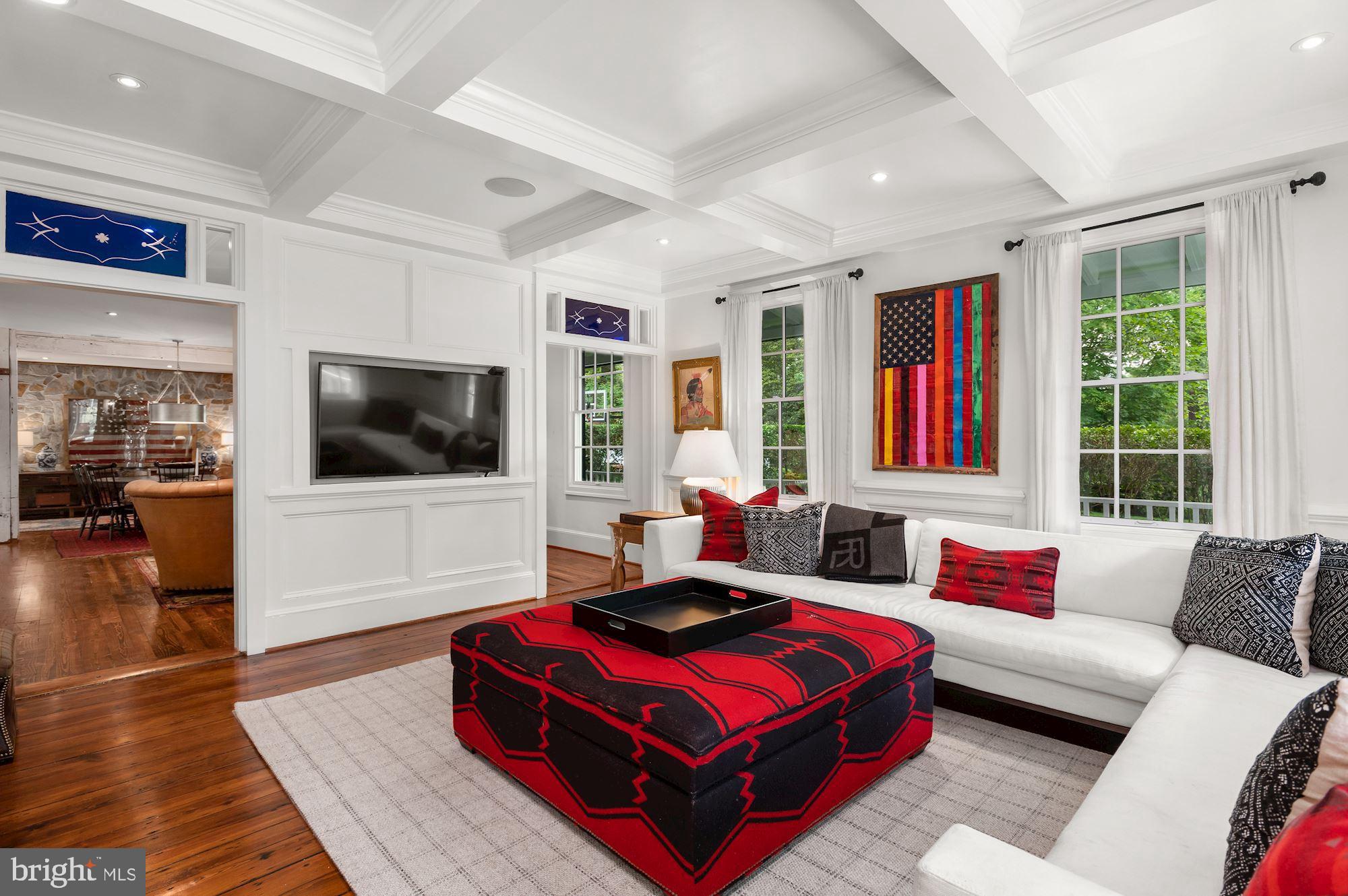 1101 Chain Bridge Road McLean, VA 22101 - Photo 5 of 54 a living room with furniture and a flat screen tv