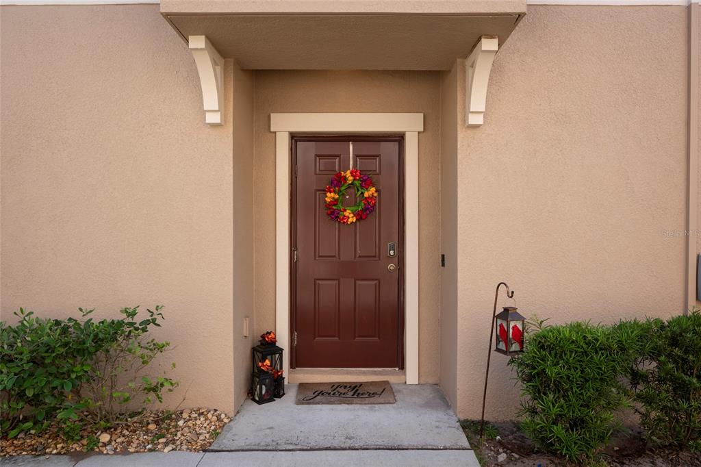 11704 Castine Street New Port Richey, FL 34654 - Photo 4 of 31 a view of entryway front of a house
