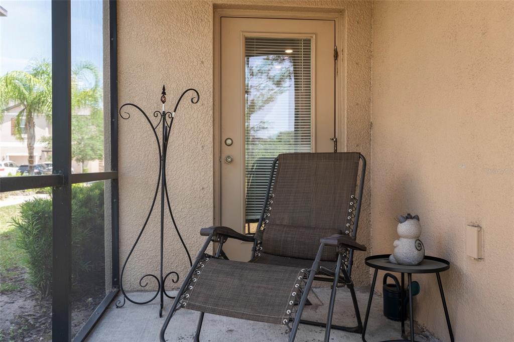 11704 Castine Street New Port Richey, FL 34654 - Photo 10 of 31 a view of a workspace with furniture and a window