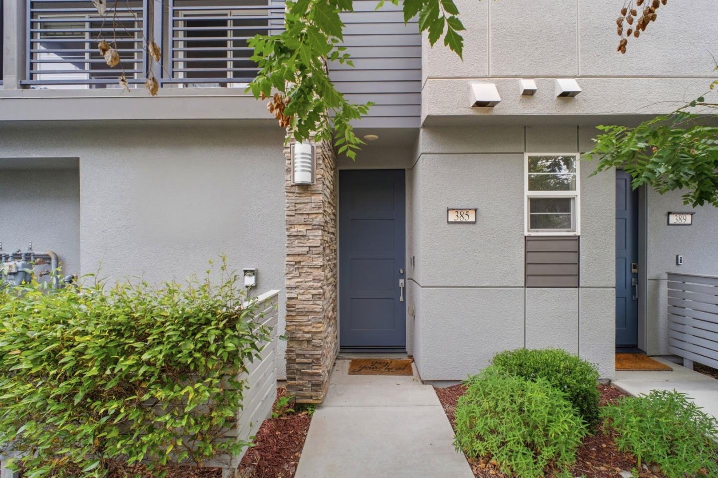 385 Line Street Hayward, CA 94544 - Photo 3 of 38 a couple of flower plants in front of door