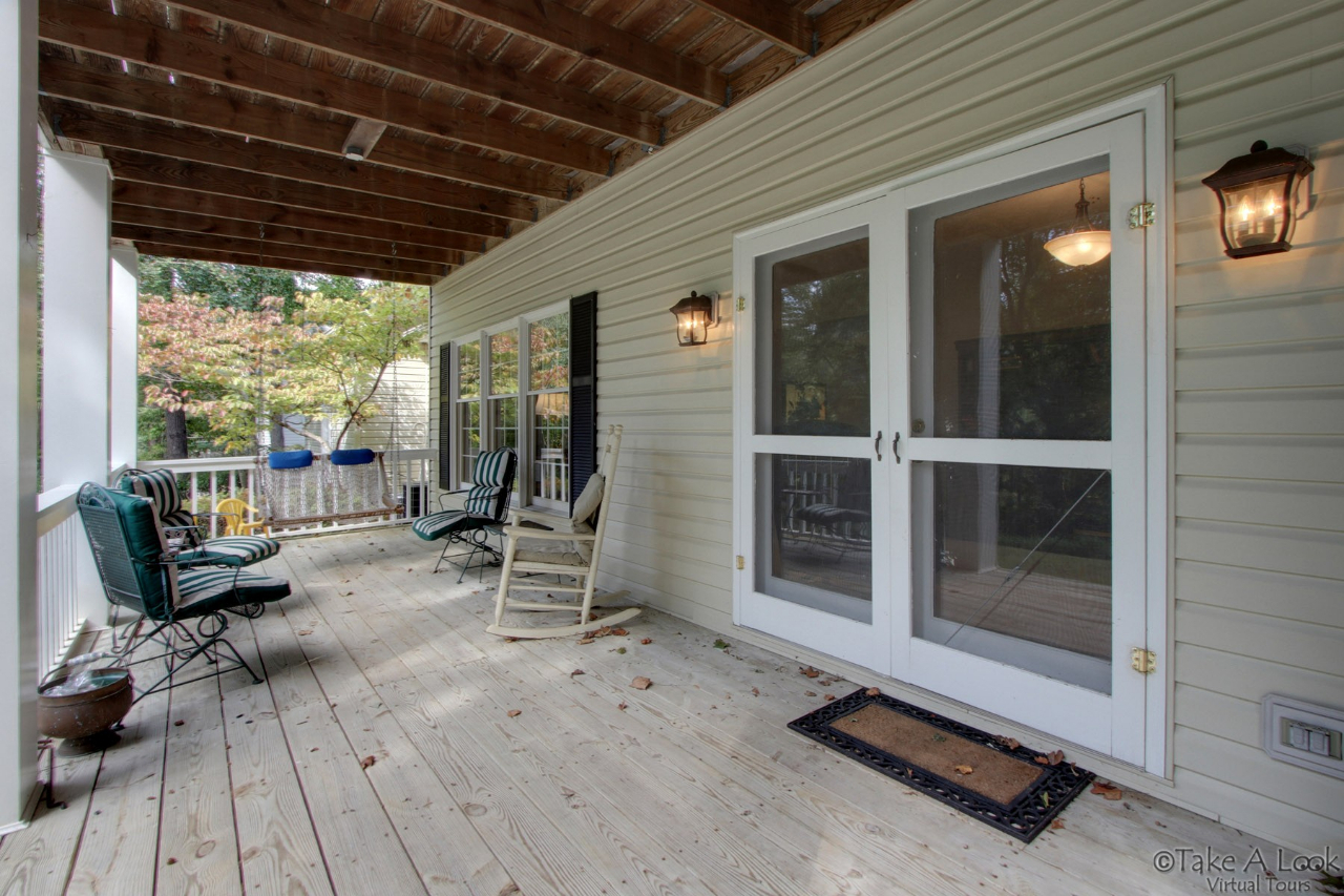 1283 Crosswind Road Goodview, VA 24095 - Photo 11 of 48 a view of a patio with table and chairs