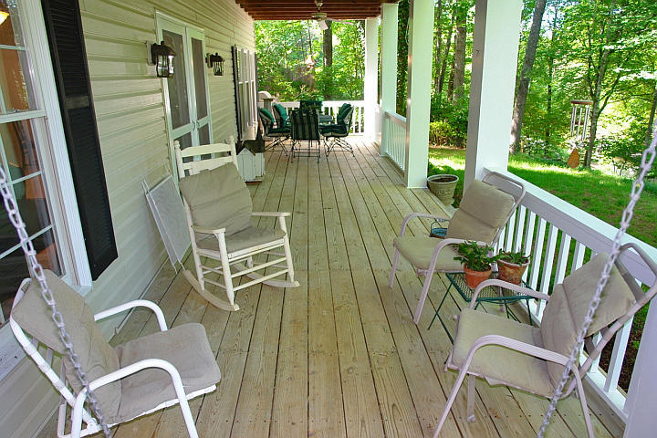 1283 Crosswind Road Goodview, VA 24095 - Photo 12 of 48 an outdoor living room with patio furniture and garden