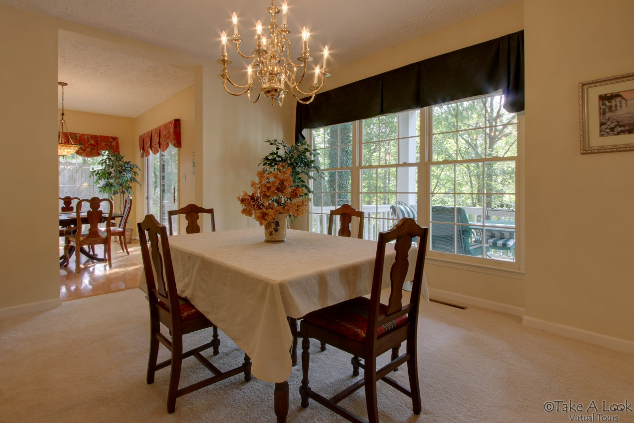 1283 Crosswind Road Goodview, VA 24095 - Photo 16 of 48 a view of a dining room with furniture window and outside view
