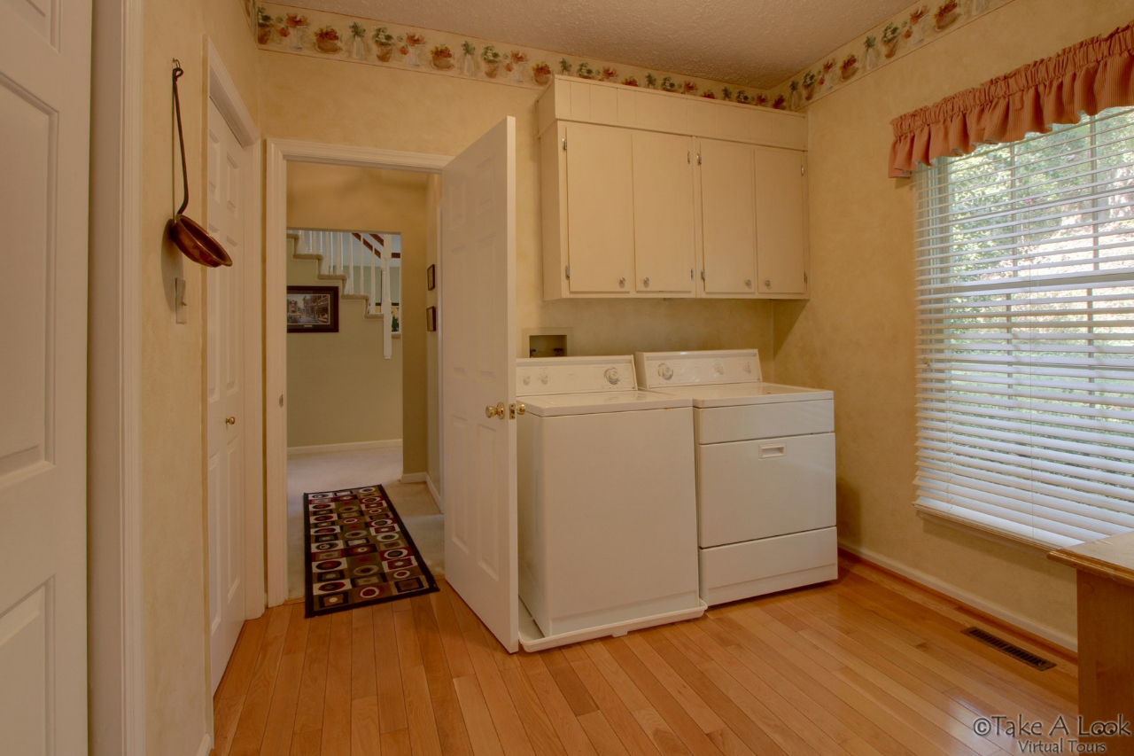 1283 Crosswind Road Goodview, VA 24095 - Photo 22 of 48 a utility room with dryer and washer