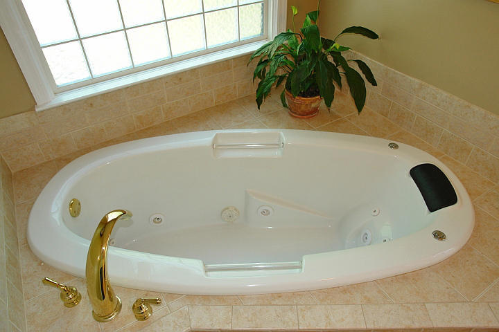 1283 Crosswind Road Goodview, VA 24095 - Photo 28 of 48 a bathroom with a bathtub