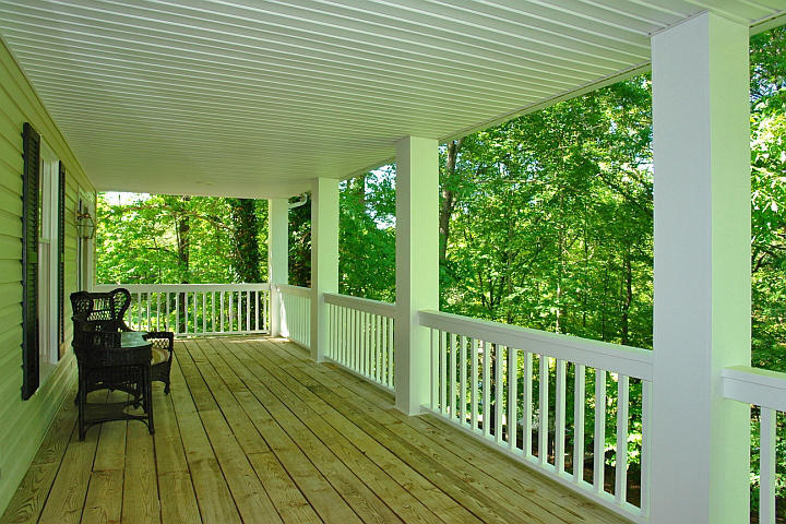 1283 Crosswind Road Goodview, VA 24095 - Photo 36 of 48 a view of a wooden deck with chairs