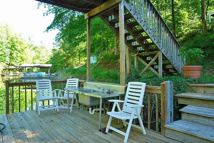 1283 Crosswind Road Goodview, VA 24095 - Photo 42 of 48 a view of a chairs and table in the deck