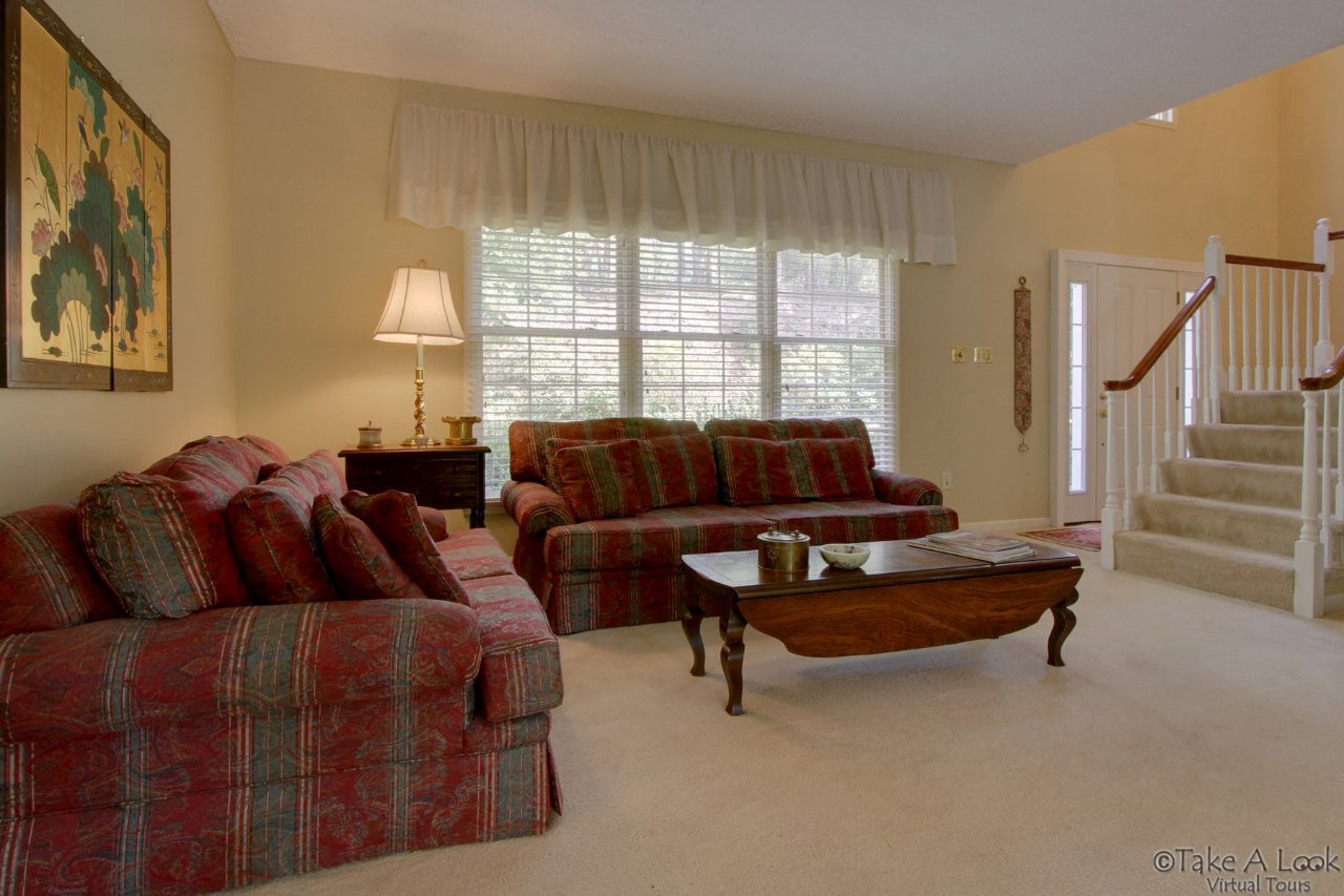 1283 Crosswind Road Goodview, VA 24095 - Photo 7 of 48 a living room with furniture and a window