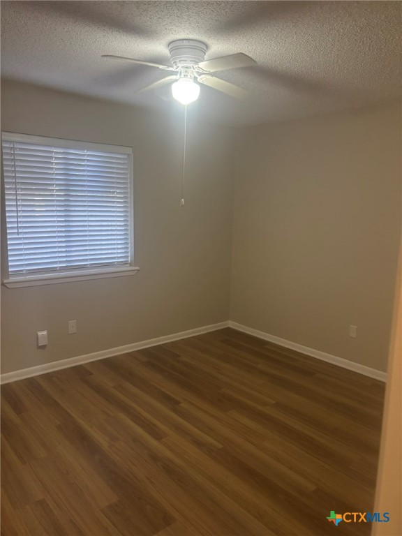 104 Milann Street Victoria, TX 77901 - Photo 10 of 10 a view of empty room with wooden floor and fan
