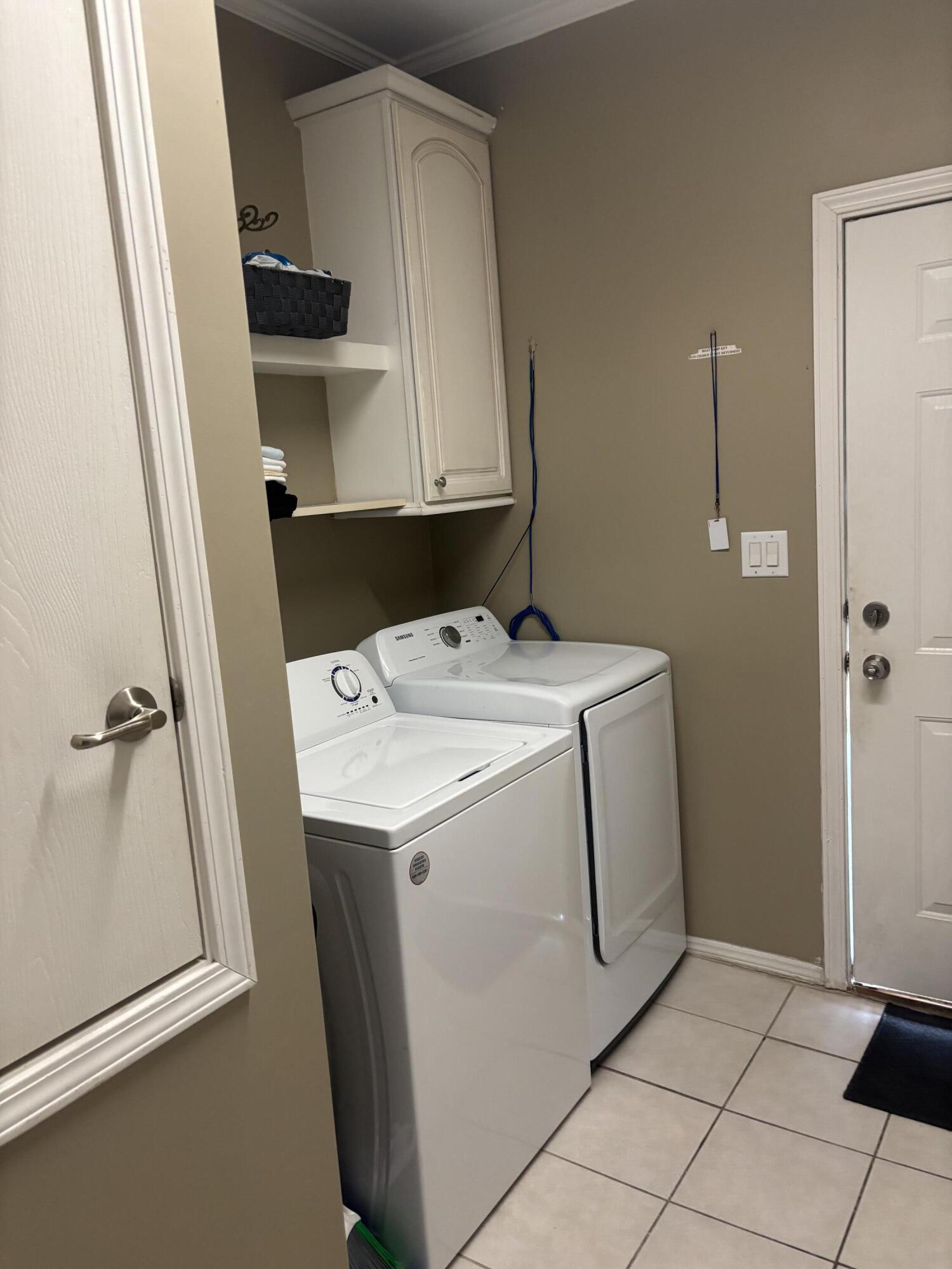210 West 2nd Court Key Largo, FL 33037 - Photo 29 of 30 a utility room with dryer and washer