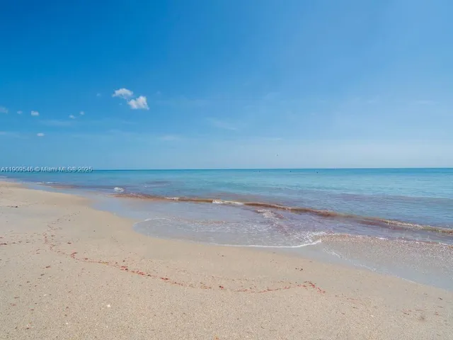 a view of beach and ocean