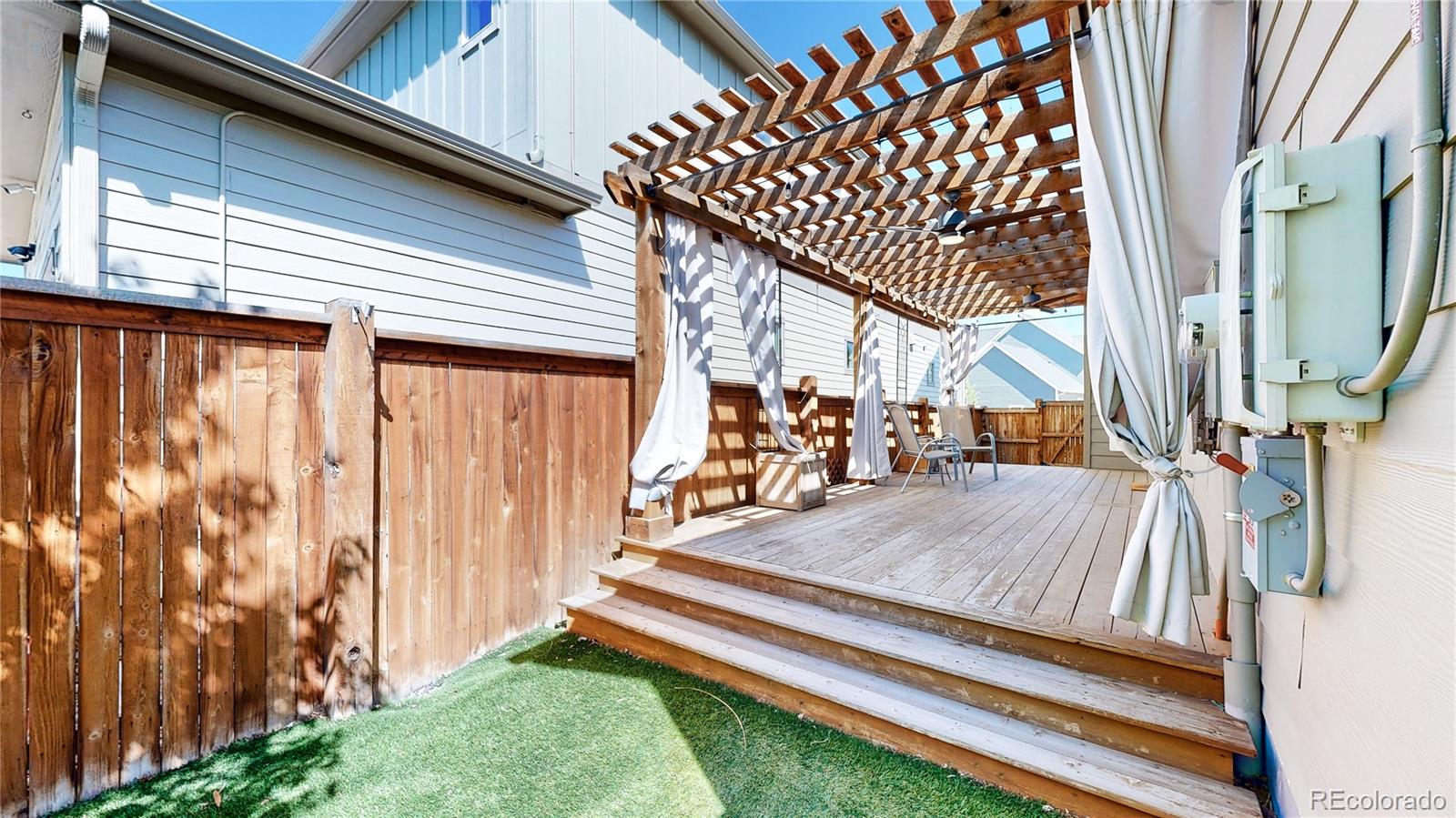 8728 54th Place Denver, CO 80238 - Photo 28 of 35 a view of outdoor space and deck