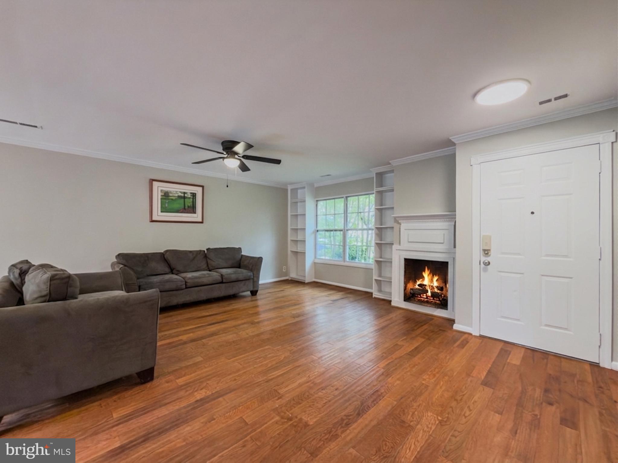 14900 Hydrus Road Silver Spring, MD 20906 - Photo 9 of 33 Cozy living space with warm ambiance.