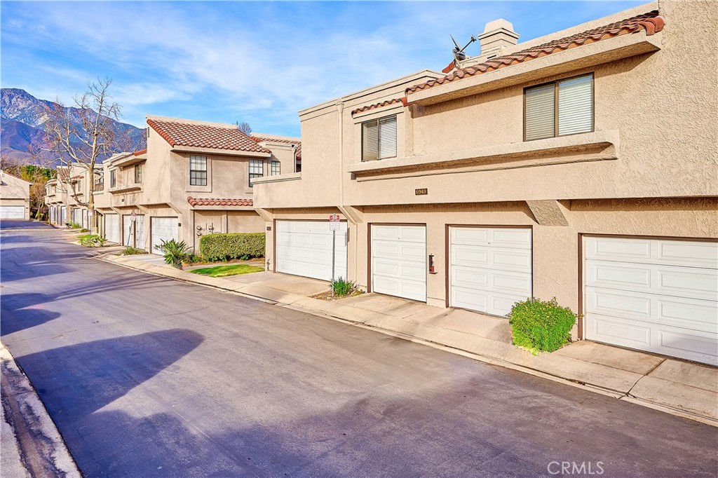6949 Laguna Place, Unit B1 Rancho Cucamonga, CA 91701 - Photo 7 of 20 a view of a house with a street