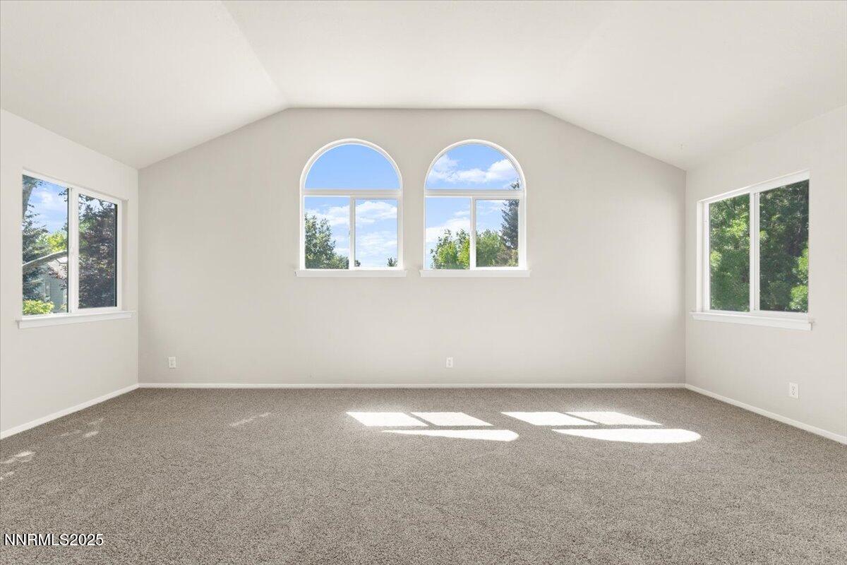 7187 Blue Falls Circle Reno, NV 89511 - Photo 23 of 42 an empty room with windows