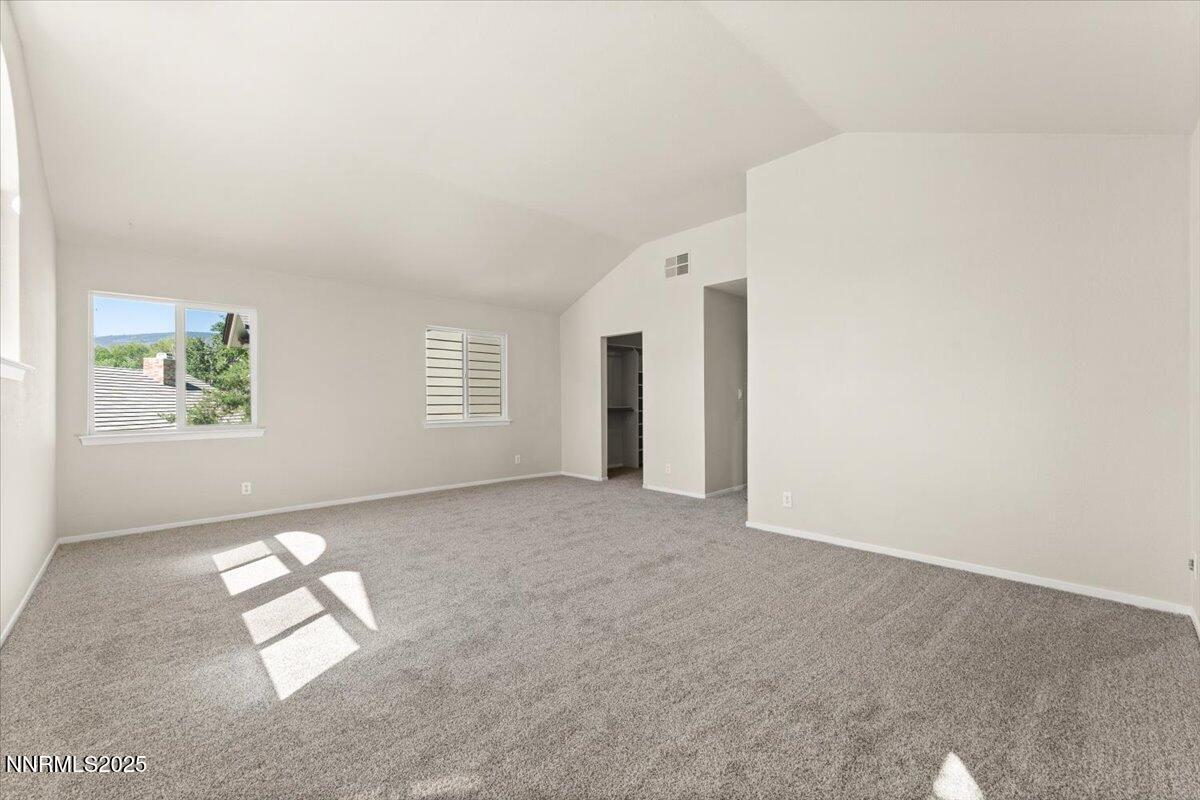 7187 Blue Falls Circle Reno, NV 89511 - Photo 25 of 42 an empty room with windows