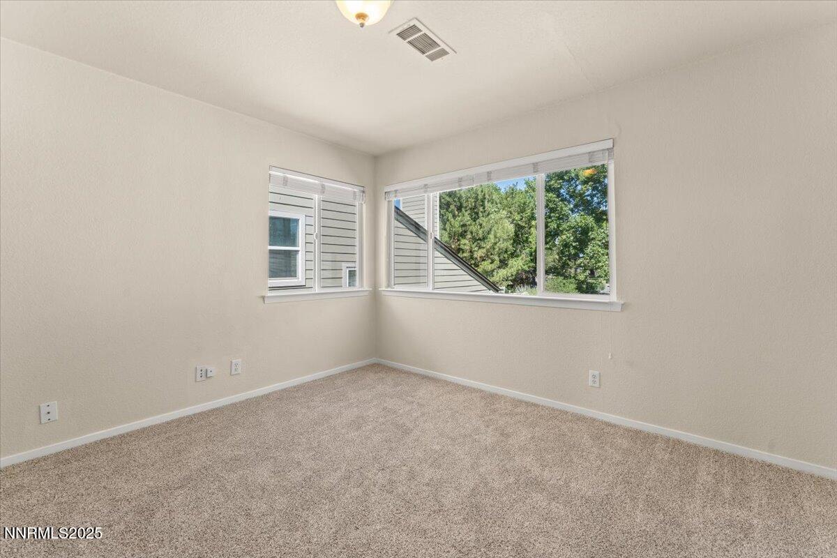 7187 Blue Falls Circle Reno, NV 89511 - Photo 29 of 42 an empty room with windows