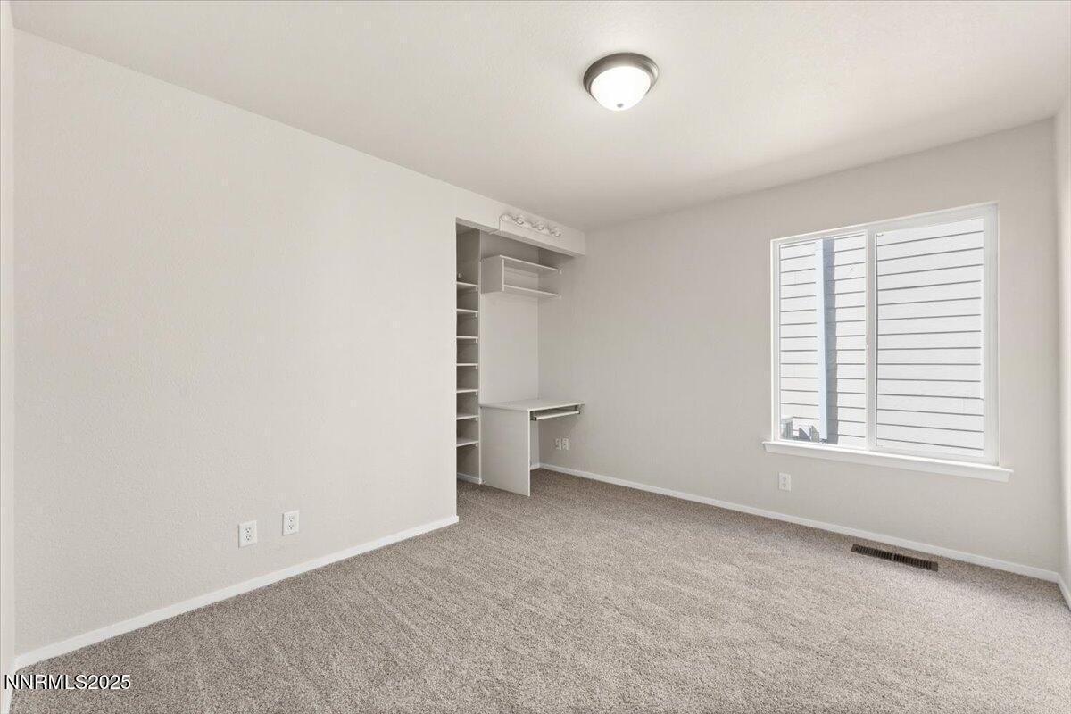 7187 Blue Falls Circle Reno, NV 89511 - Photo 31 of 42 an empty room with a window