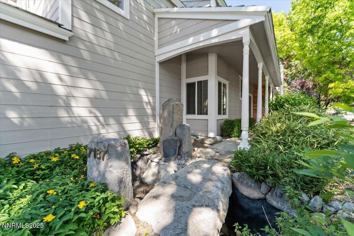 7187 Blue Falls Circle Reno, NV 89511 - Photo 5 of 42 a front view of a house with a yard