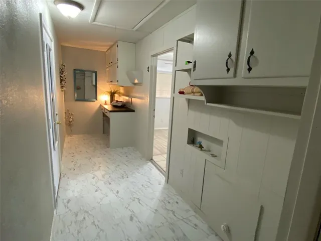 a bathroom with a sink and mirror