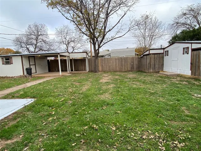 a house view with a garden space