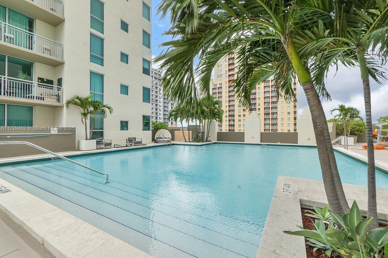 9055 Southwest 73rd Court, Unit 903 Miami, FL 33156 - Photo 13 of 24 a view of outdoor space with seating area