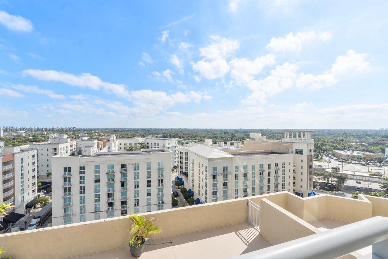 9055 Southwest 73rd Court, Unit 903 Miami, FL 33156 - Photo 23 of 24 a view of a balcony with city view