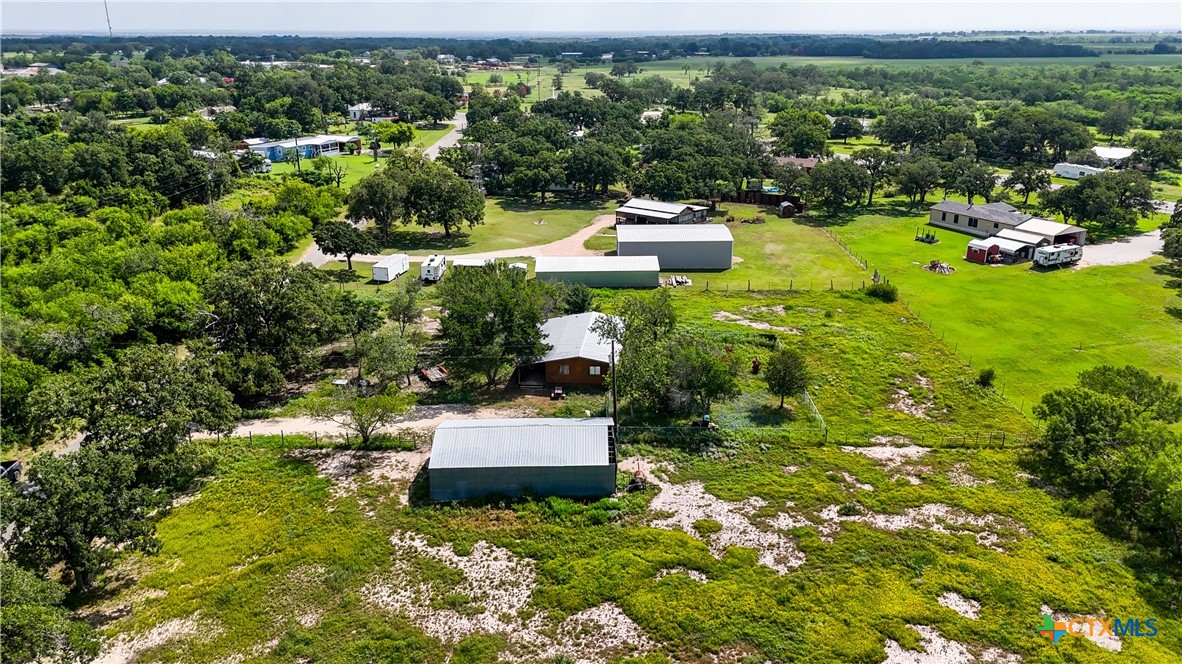 275-279 Cross Road Kingsbury, TX 78638 - Photo 22 of 36 a view of a garden with lawn chairs