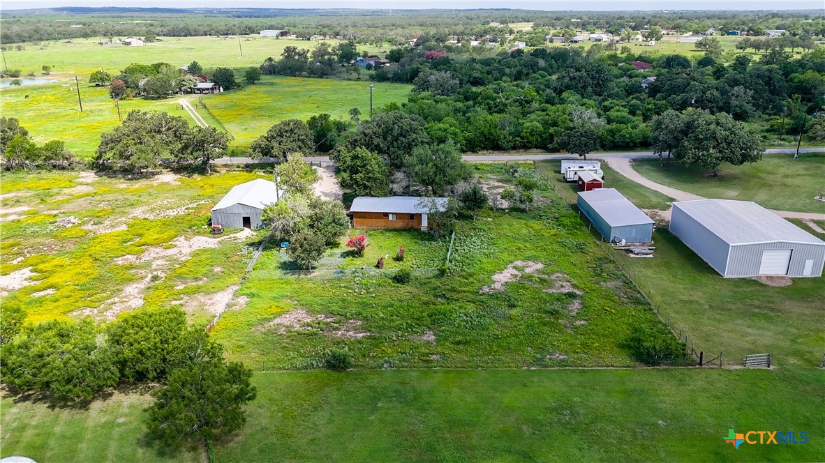 275-279 Cross Road Kingsbury, TX 78638 - Photo 23 of 36 a view of a house with a yard and lake view
