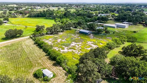 a view of a lake with a houses