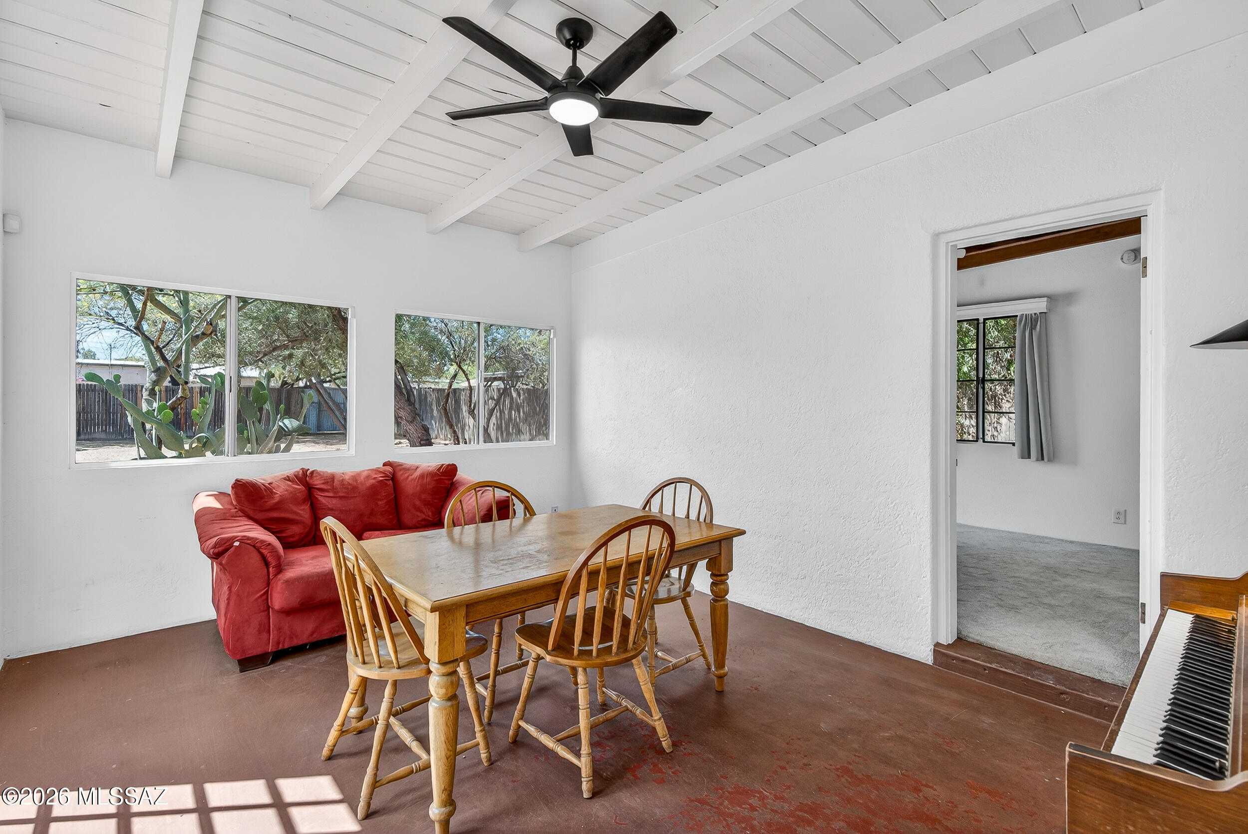 1412 East Spring Street Tucson, AZ 85719 - Photo 19 of 43 a dining room with furniture and a window