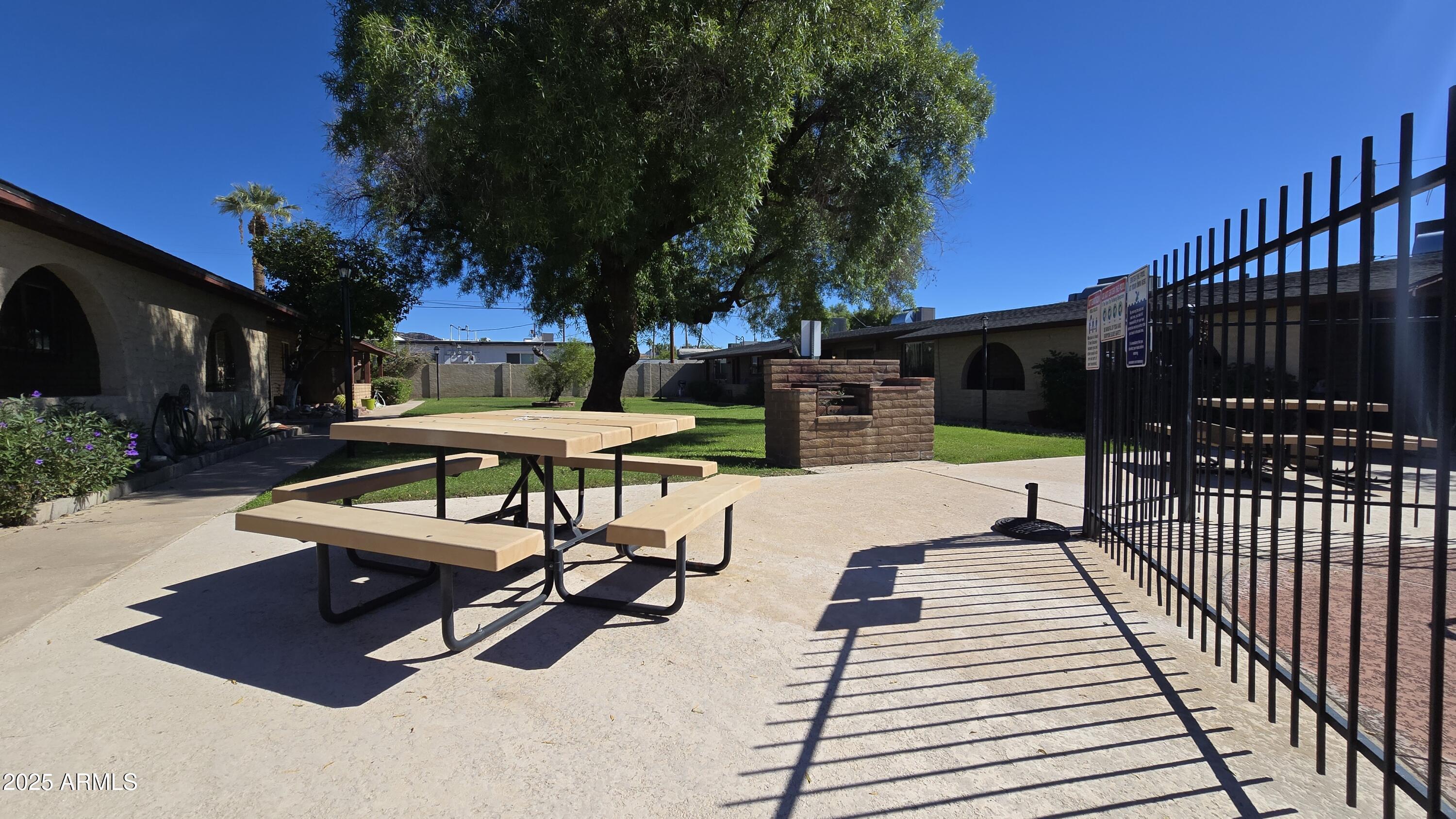 6739 North 16th Street, Unit 14 Phoenix, AZ 85016 - Photo 18 of 19 a view of a backyard with sitting area