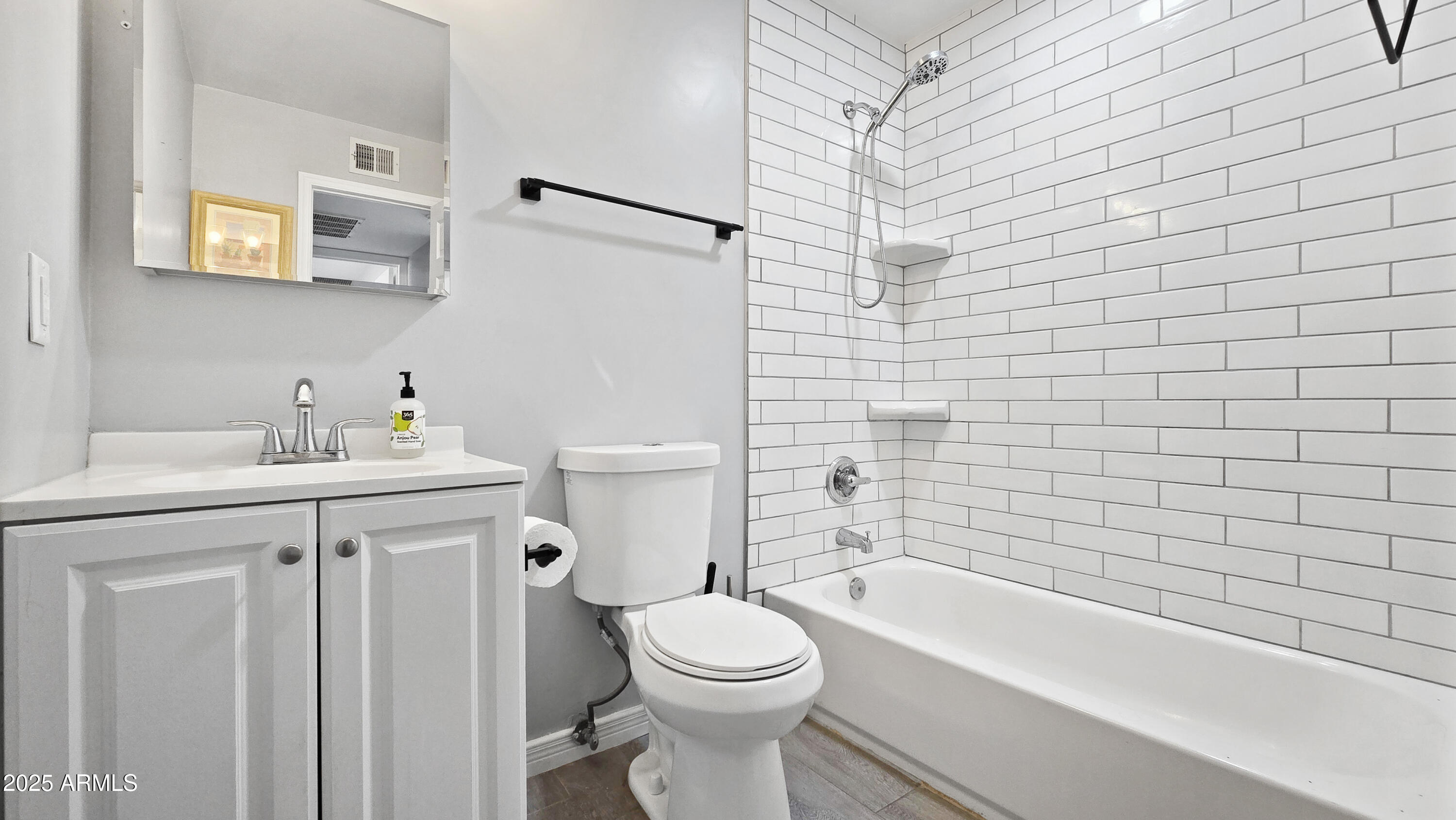 6739 North 16th Street, Unit 14 Phoenix, AZ 85016 - Photo 9 of 19 a bathroom with a sink a toilet and bathtub