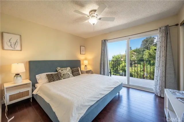 a bathroom with a double vanity sink toilet and shower