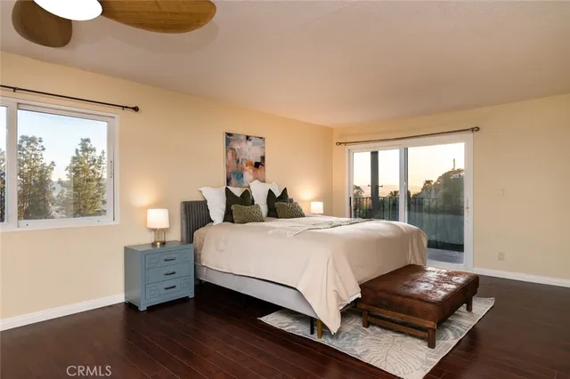 a view of balcony with wooden floor