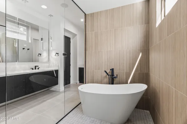 a bathroom with a sink a toilet and a bathtub