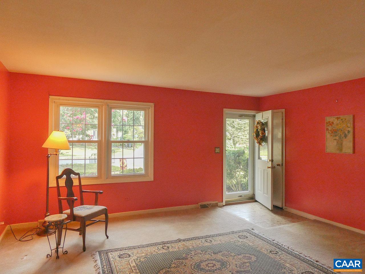 708 Shamrock Road Charlottesville, VA 22903 - Photo 4 of 22 a view of an empty room with furniture and windows