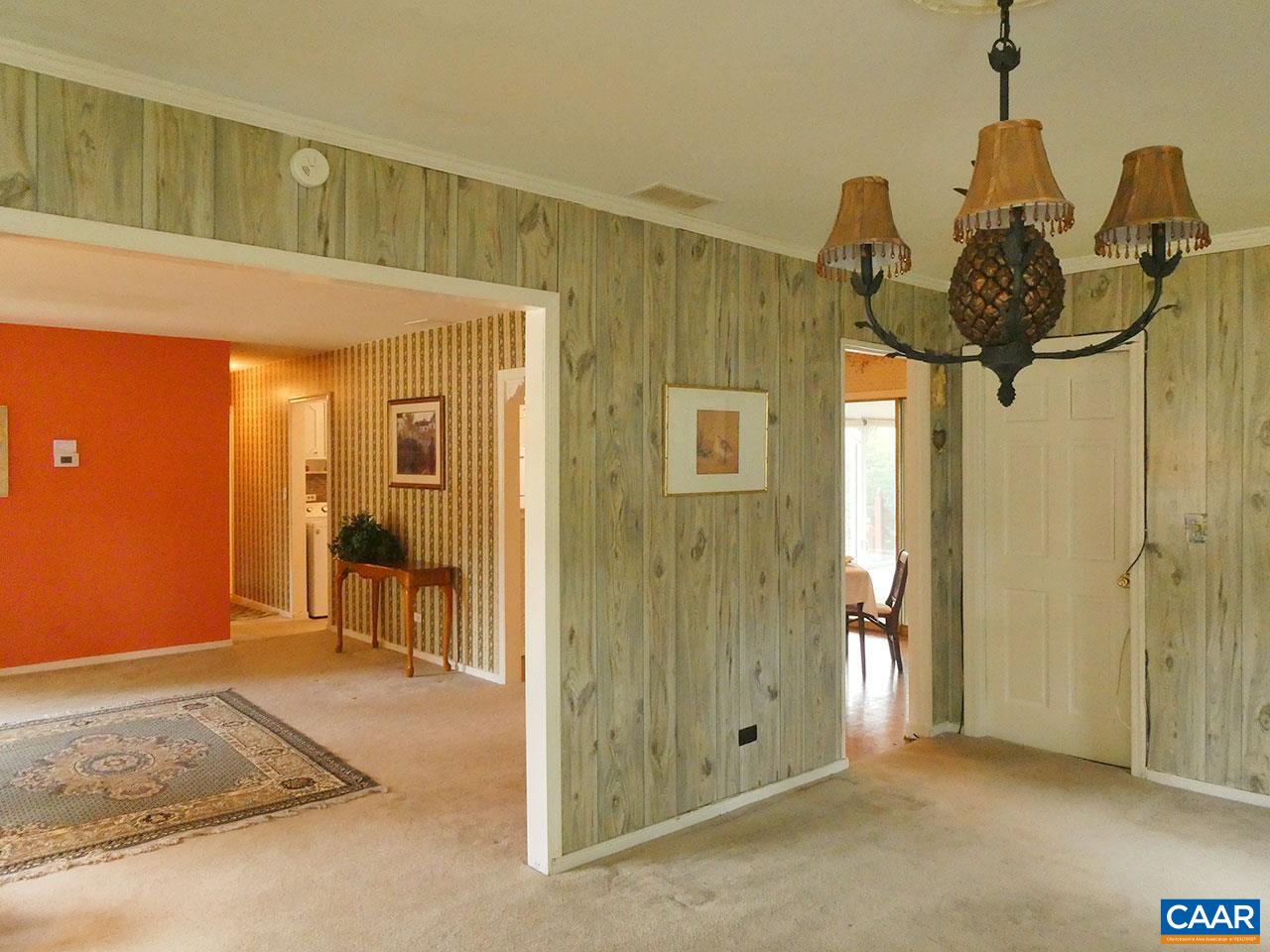 708 Shamrock Road Charlottesville, VA 22903 - Photo 7 of 22 a view of a hallway with a chandelier