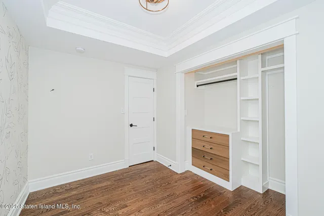 a view of room with walk in closet