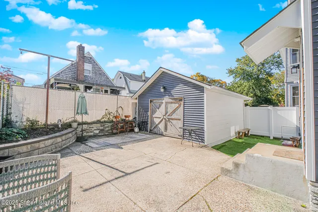 a view of a house with a patio