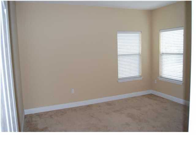 473 Lime Crestview, FL 32536 - Photo 5 of 16 a room with a window and a lamp