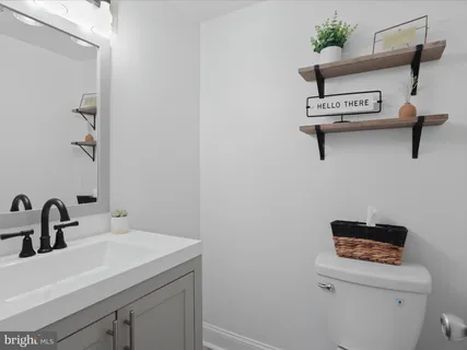 a bathroom with a sink and a toilet