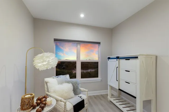 a view of a door and chair in a room