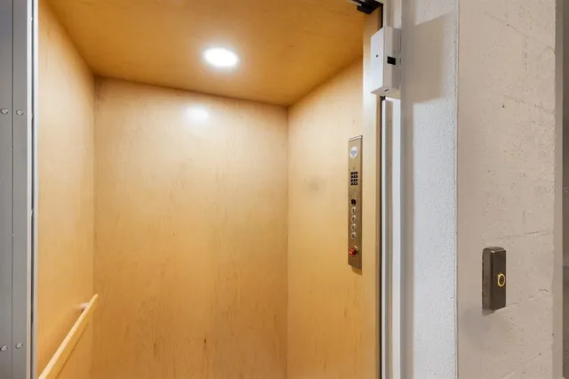 a bathroom with a sink mirror vanity and toilet
