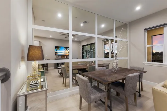 a kitchen that has a sink and a stove top oven