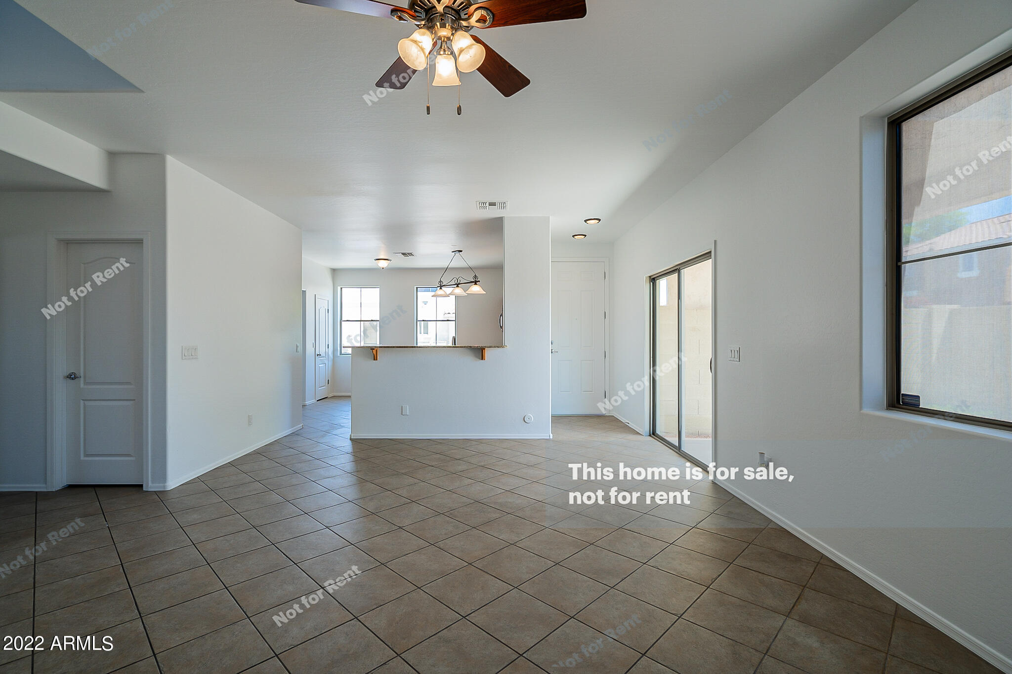 899 East Devon Road Gilbert, AZ 85296 - Photo 7 of 23 a view of an empty room and window