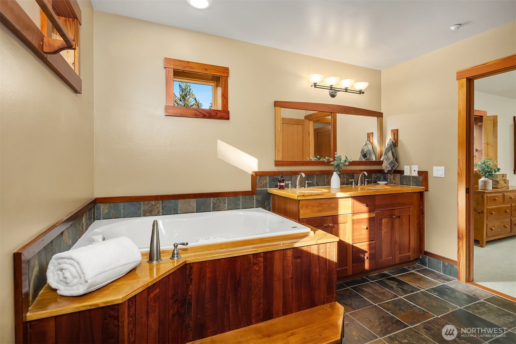 12317 176th Avenue Southeast Renton, WA 98059 - Photo 14 of 39 a bedroom with a bed and dresser