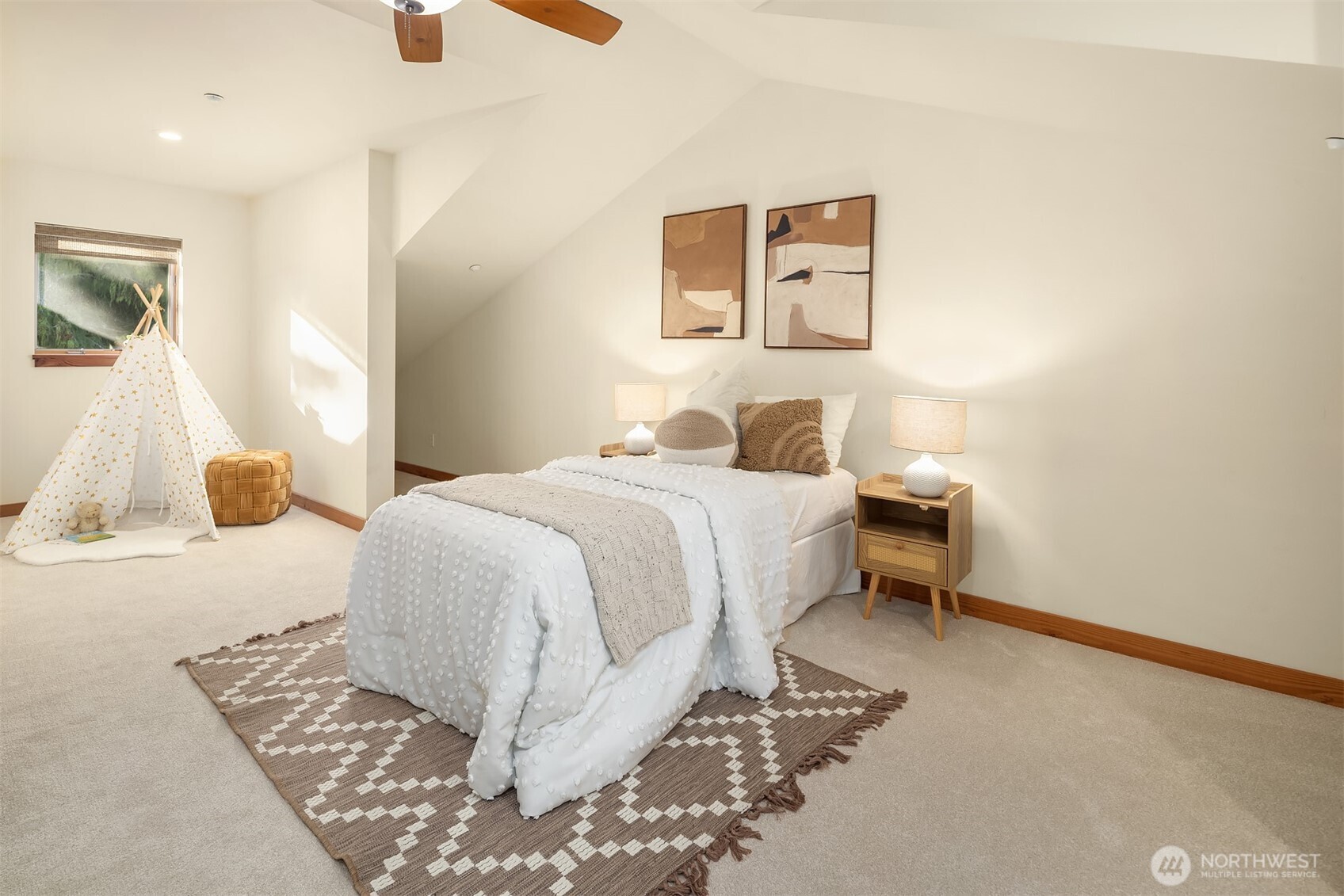 12317 176th Avenue Southeast Renton, WA 98059 - Photo 21 of 39 a bedroom with a bed and wooden floor