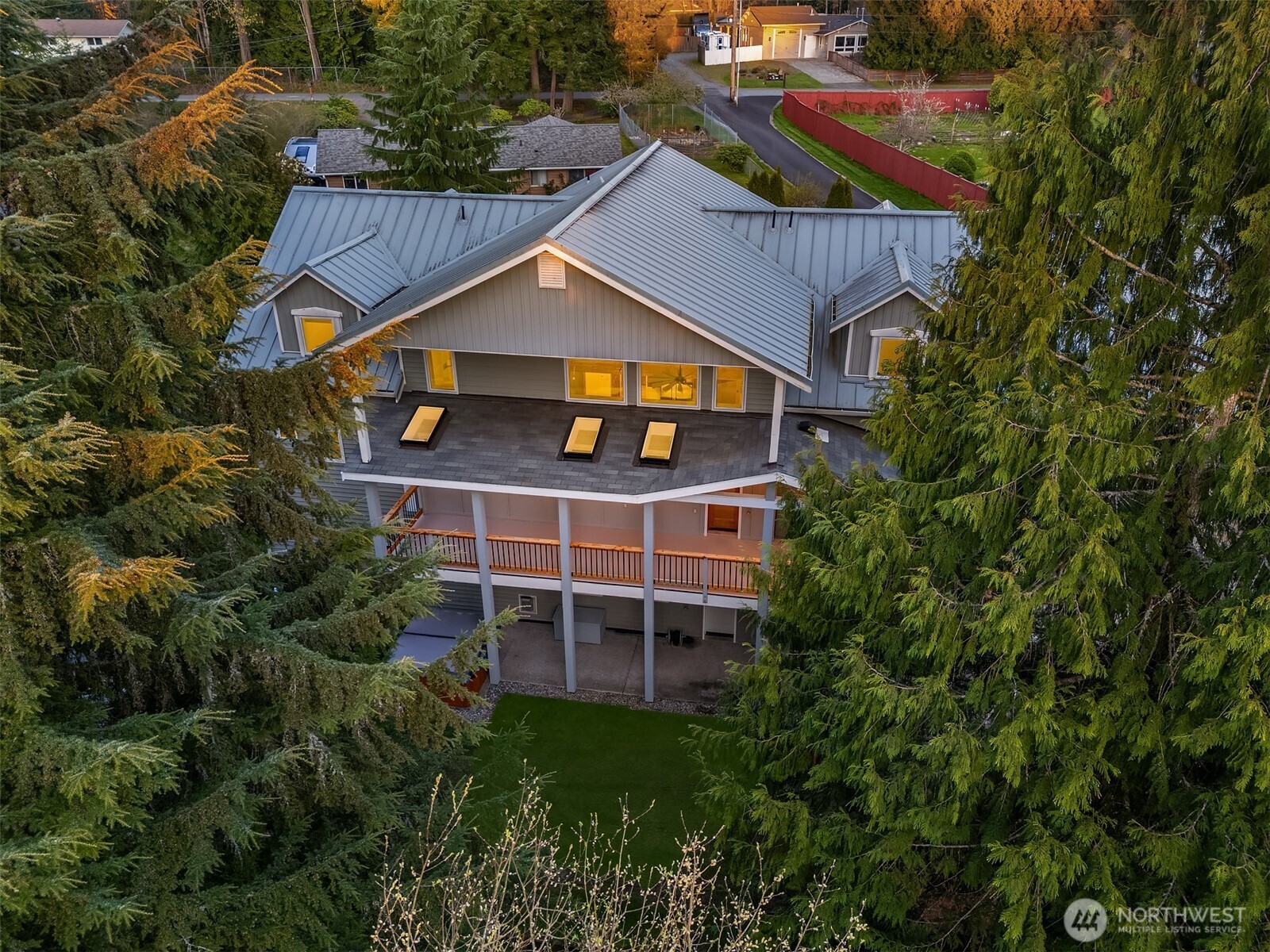 12317 176th Avenue Southeast Renton, WA 98059 - Photo 36 of 39 an aerial view of a house with a yard and potted plants