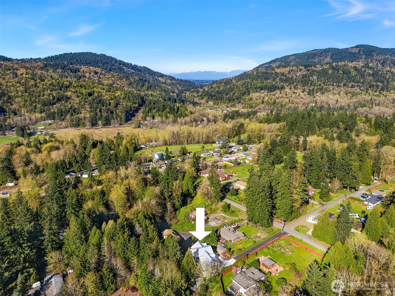 12317 176th Avenue Southeast Renton, WA 98059 - Photo 38 of 39 a view of a city with mountains in the background